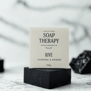 Moisturizing organic soap bar with charcoal and aniseed, ideal for healthy skin.