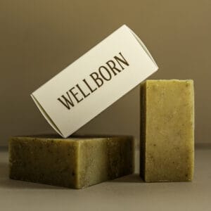 Wellborn soap bar with soap box, natural skincare product.