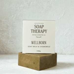 Alt text: Handcrafted organic soap with goat milk and chamomile from Soap Therapy for healthy skin.