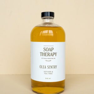 Olea Sentry soap therapy with vetiver and tea tree for skin wellness.