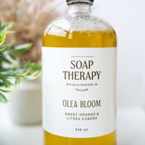 Olea Bloom soap therapy bottle with sweet orange and litsea cubeba scent.